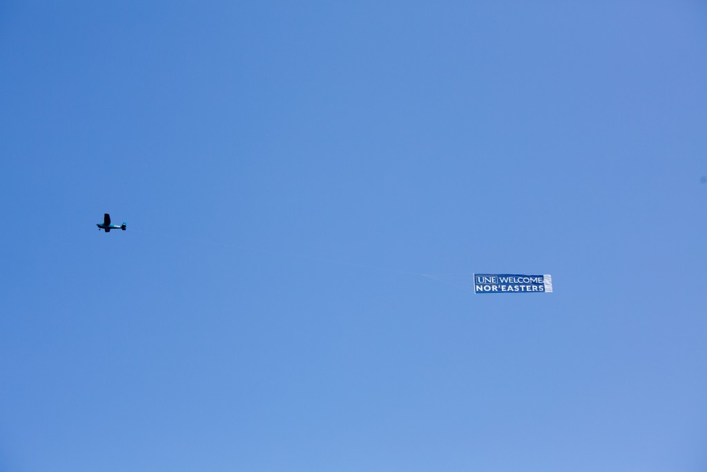 A plane flew overhead welcoming new students as they moved in.