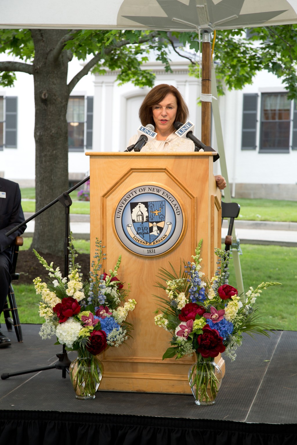President Danielle Ripich addresses alumni who contributed to the Alumni Hall restoration project.
