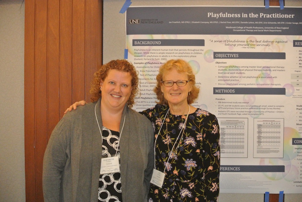 Professors Crampsey and Froehlich present their poster