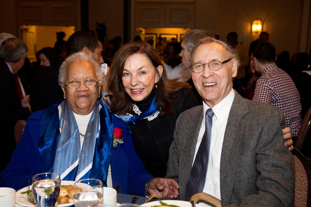President Ripich (center) visits with UNE Board of Trustees member Jerry Talbot (right) and his wife, Anita.