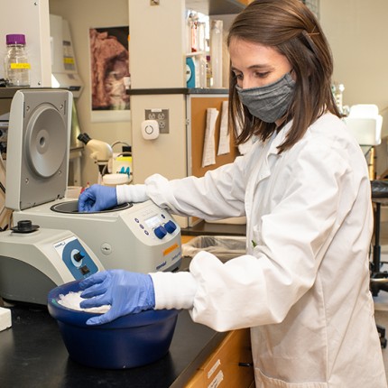 A student using lab equipment