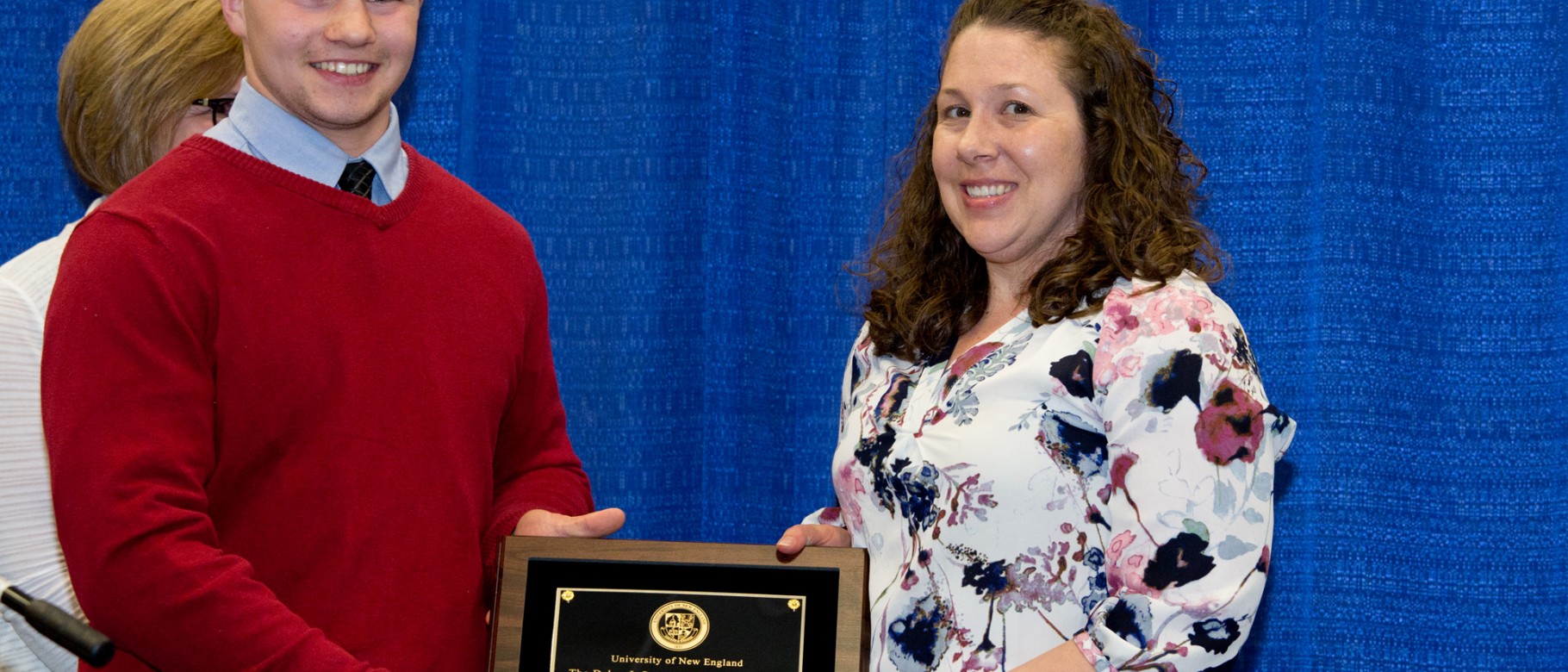 Amy Keirstead, Ph.D., professor of chemistry, receives the Debra J. Summers Memorial Award for Teaching in Excellence from Jesse