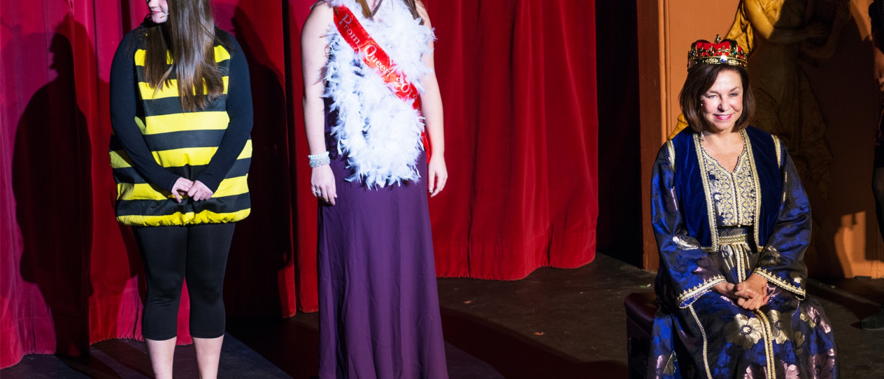 UNE President Danielle Ripich plays the "UNE Queen" in a skit in Doc Samuel's Variety Show