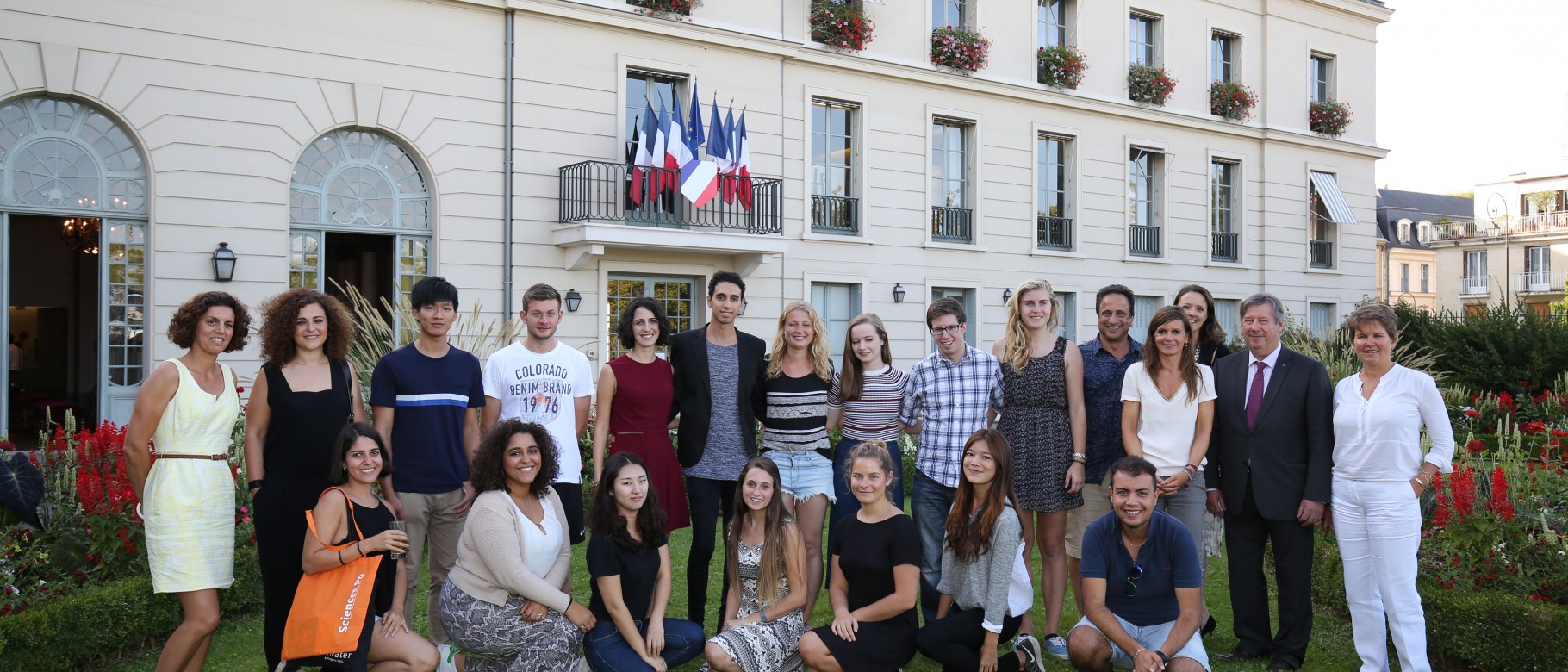 Anouar Majid and Camille Logiudice ’19 join students and staff of Sciences Po and city officials.