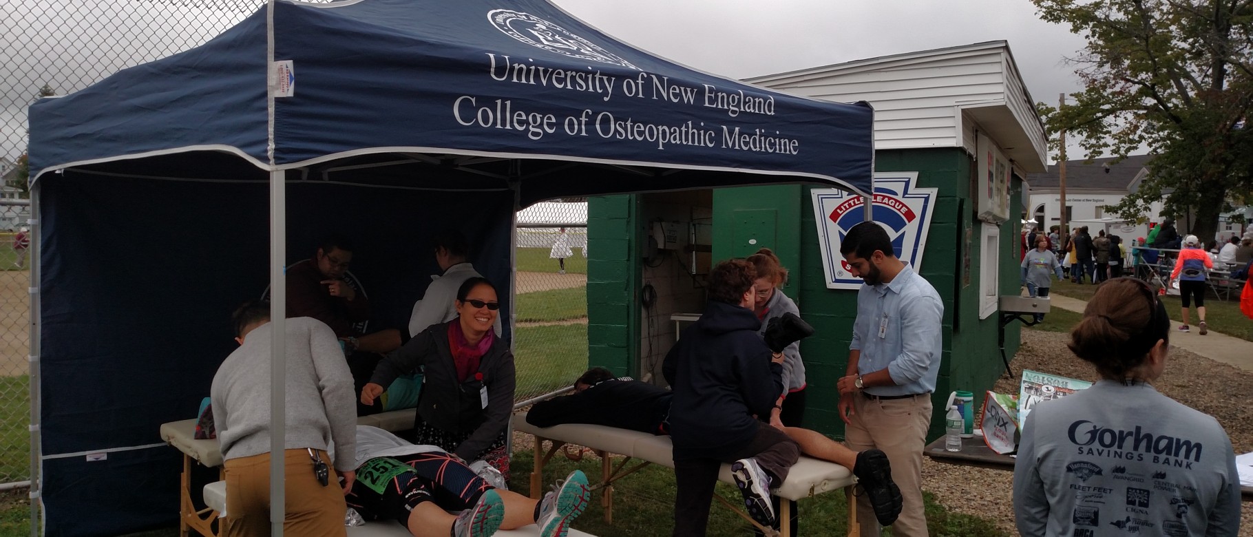 UNE osteopathic medical students treat runners at the Maine Marathon