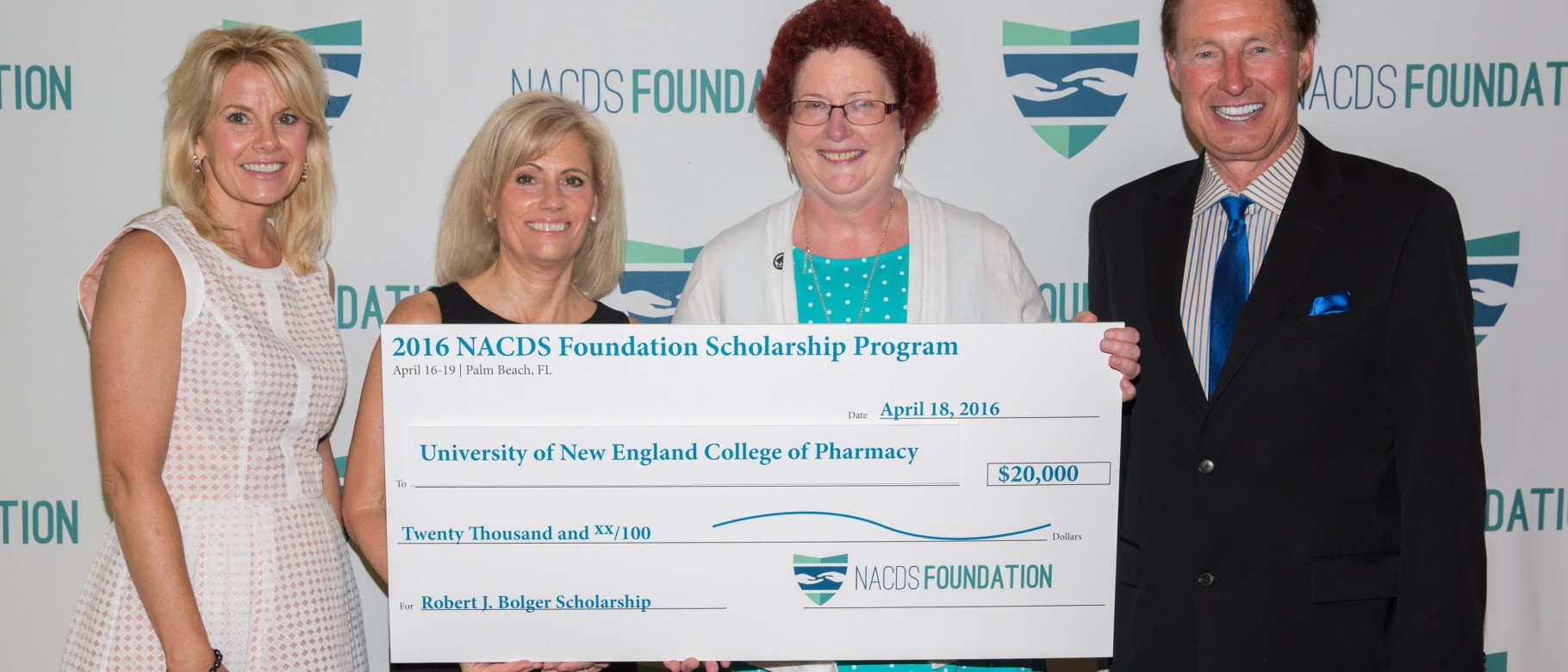 Gayle Brazeau, Ph.D., dean of the College of Pharmacy, accepts the NACDS Foundation Scholarship