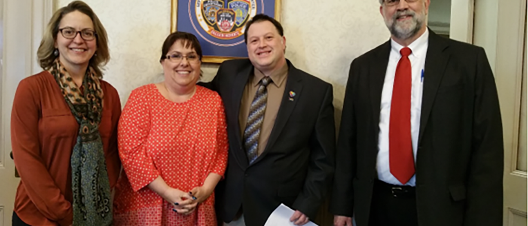 Caryn Husman, Cathy Dionne of the Autism Society of Maine, Councilor Robert Quattrone and Mayor Alan Casavant
