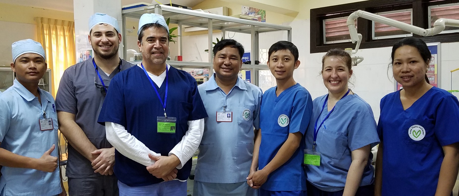 Mitchell Mamorsky (second from left) with UNE faculty and dentists from the at Angkor Hospital for Children