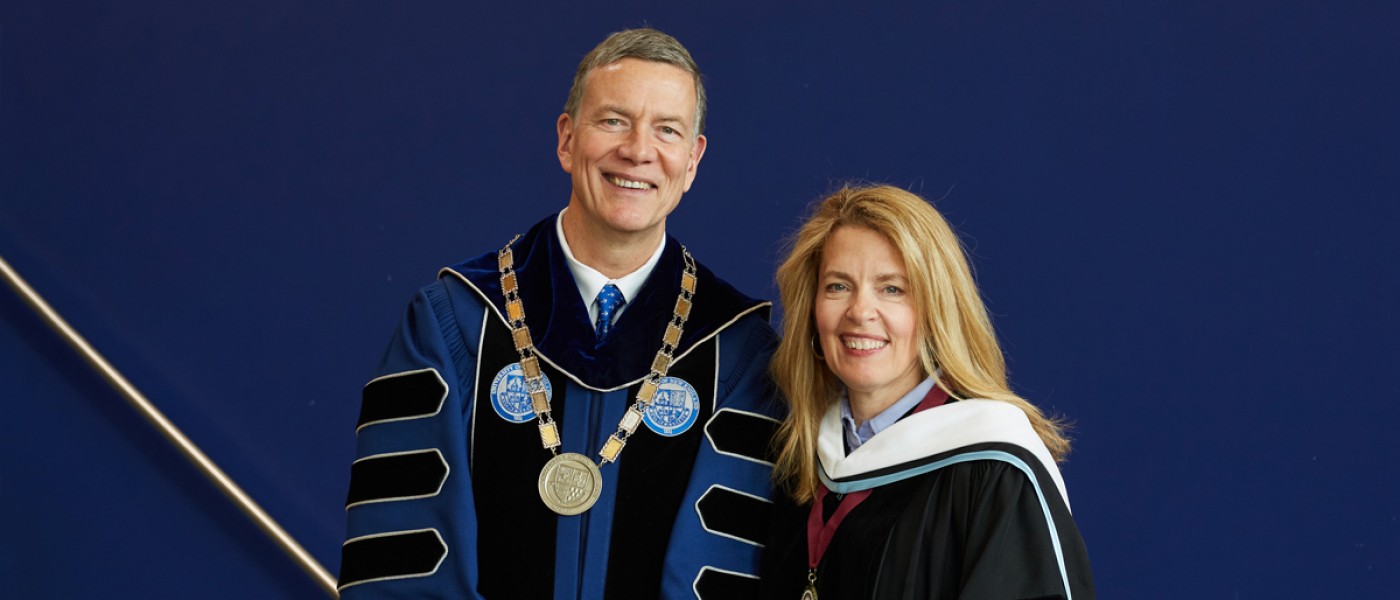 President Herbert and Melissa Smith smile at the camera