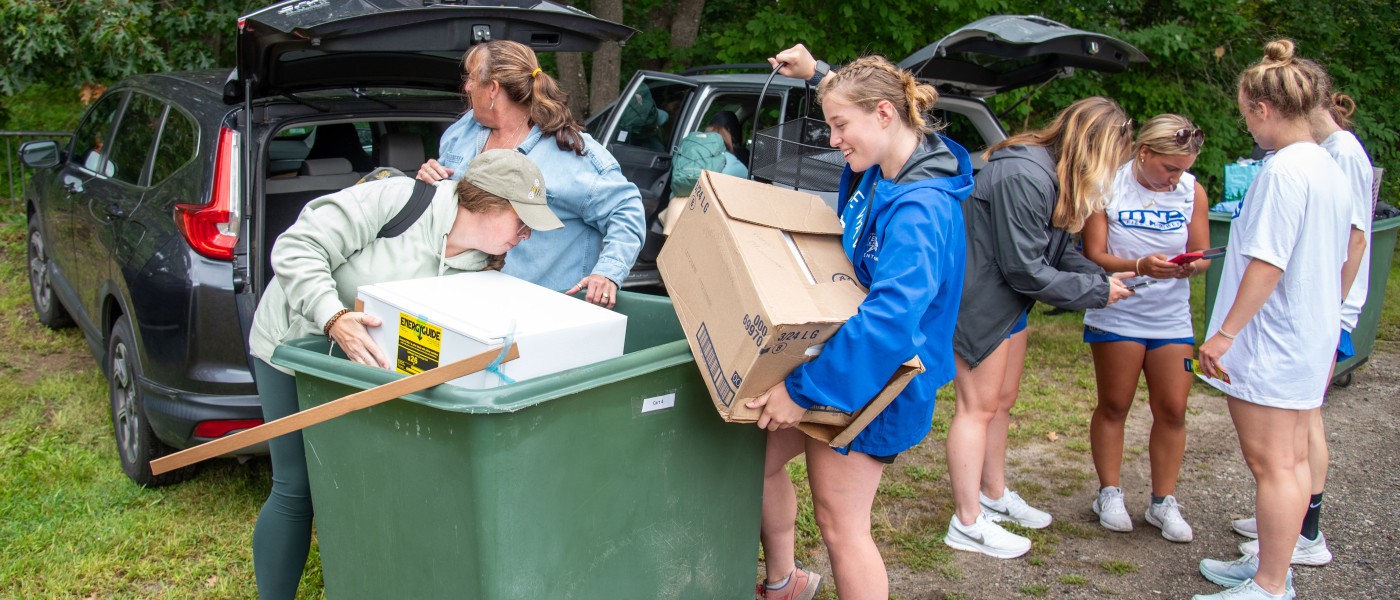 Students unload their vehicles in preparation of move-in