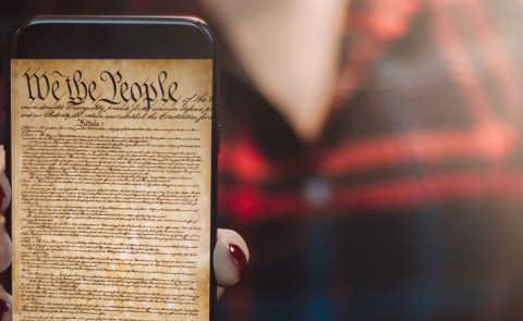 The U.S. Constitution is shown on a smartphone 