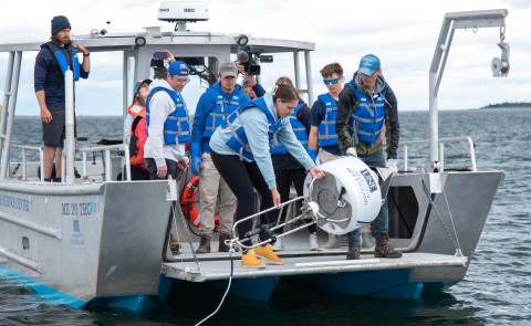 Students and faculty deploy a real-time shark detection buoy in Saco Bay