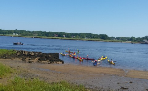 Students in UNE's Early College Program kayak in the Saco River.