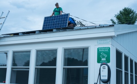 ReVision employees installed a total of 12 solar panels on the roof of the Bishop Street bus shelter. The energy generated will 
