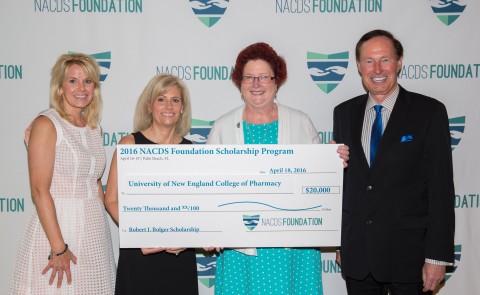 Gayle Brazeau, Ph.D., dean of the College of Pharmacy, accepts the NACDS Foundation Scholarship