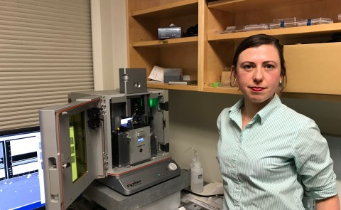 Eve Rose Balog with the state-of-the-art Atomic Force Microscope