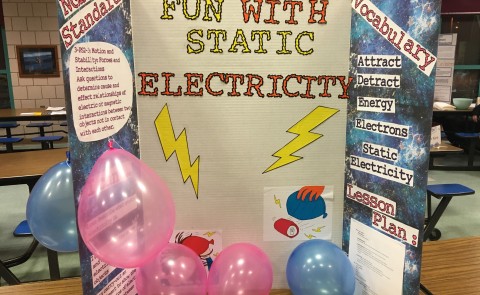 A static electricity learning station, created by UNE education students Summer McGowan and Jessica Loverdi, was one of 12 stati