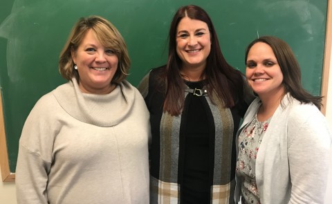 Krysten Gorrivan with Maine Teacher of the Year Heather Whitaker and Brooke Proulx of UNE's Master of Social Work program