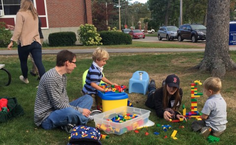 LEND Trainee Matt Pascarella and Lindsey Rose, PT, D.P.T., interact with children at the annual picnic.