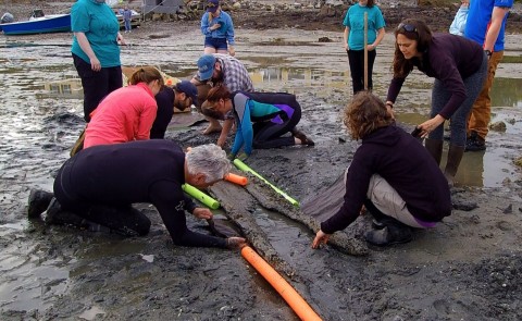 Students helped unearth and recover the canoe off Cape porpoise