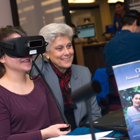 A physician assistant student wears a VR headset 
