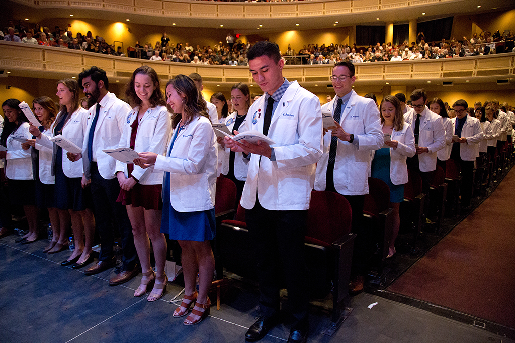 U N E College of osteopathic medicine students sit in the audience during the white coat ceremony