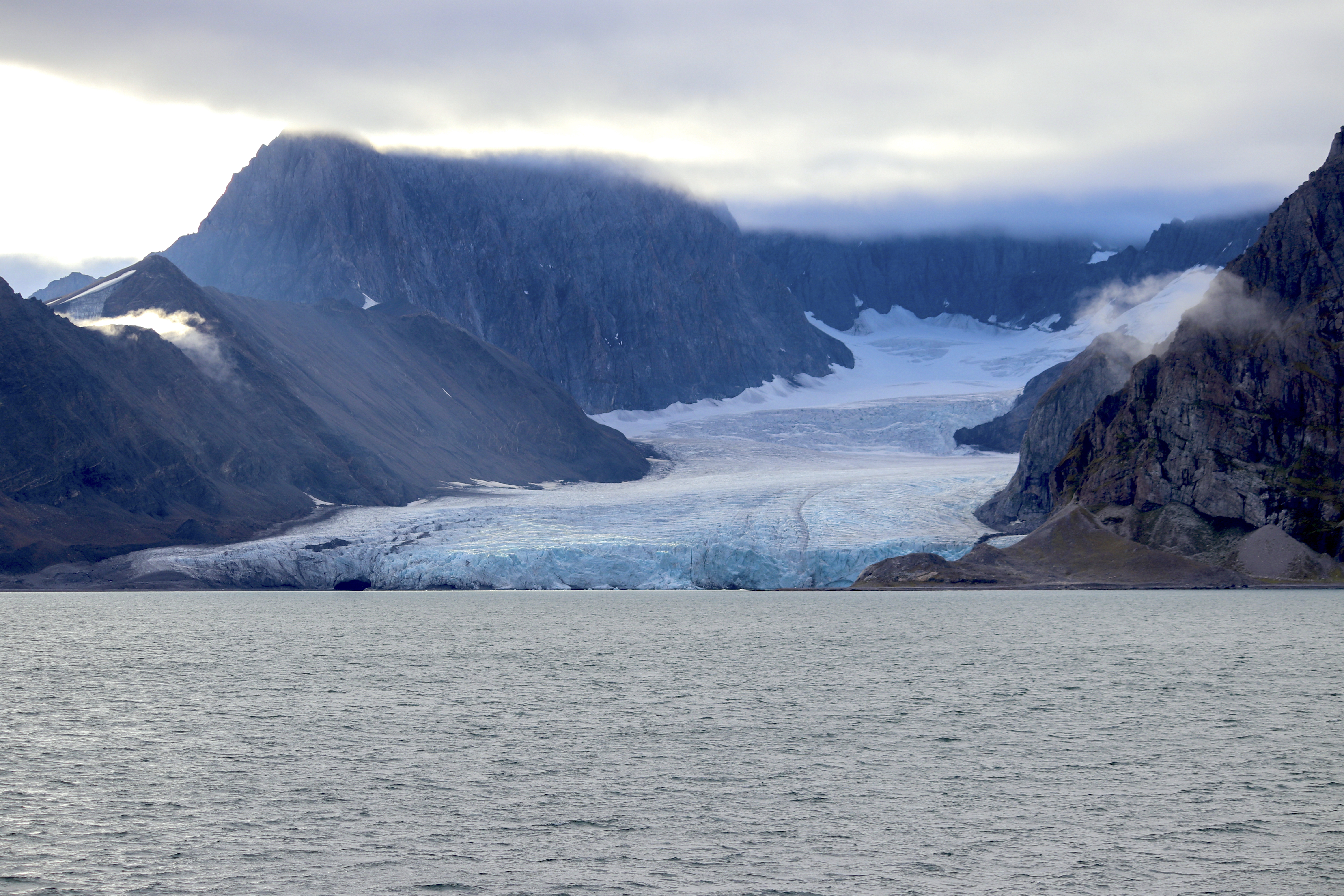 A glacier meets the ocean in Greenland
