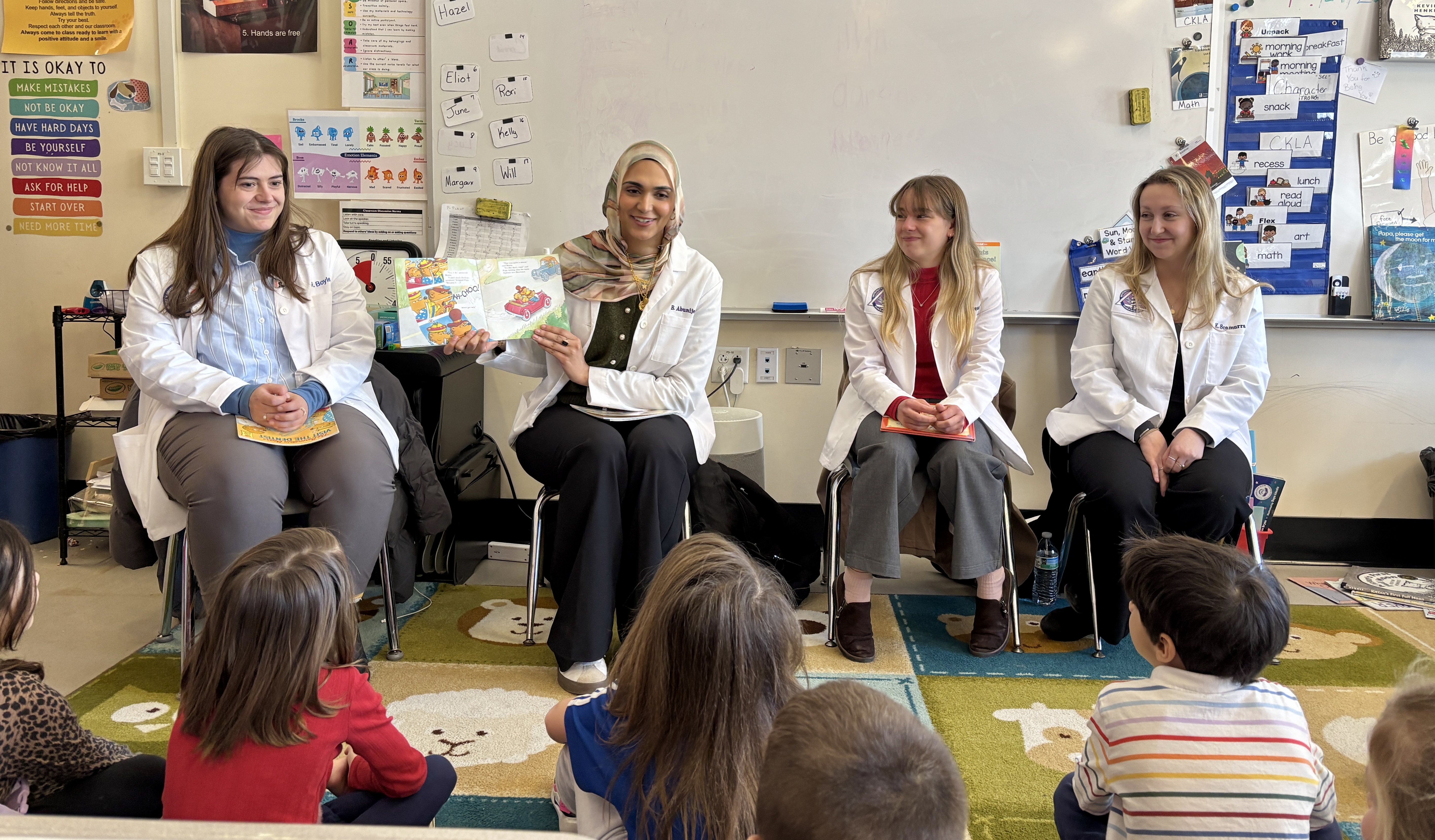 UNE students in health care professions read to local youth.