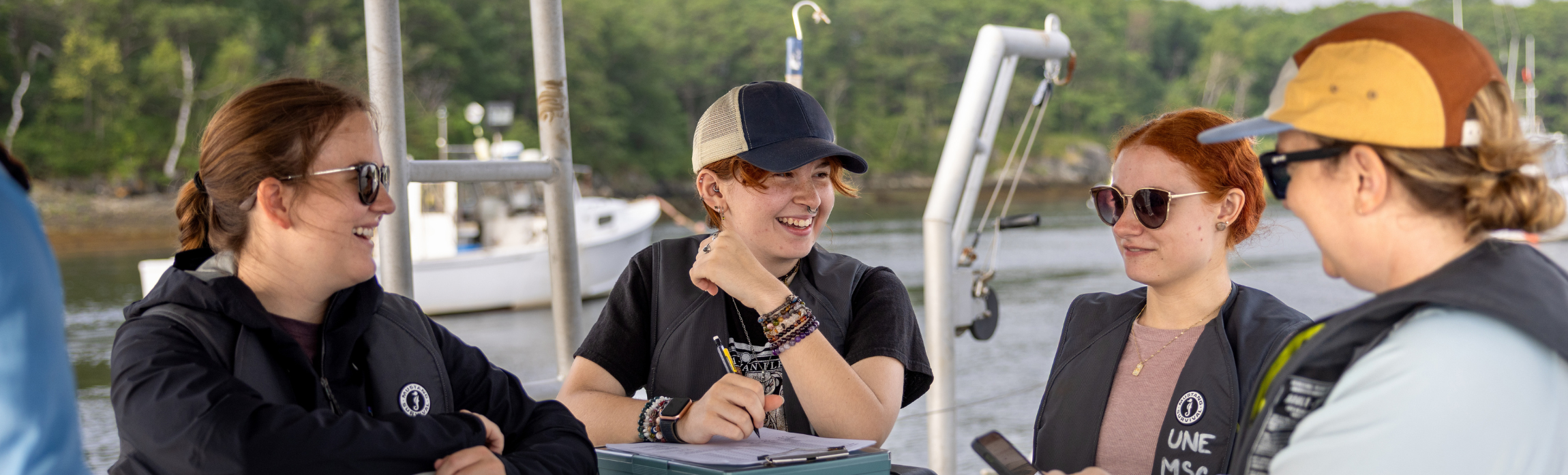 Kara Mickiewicz with her faculty advisor and other students