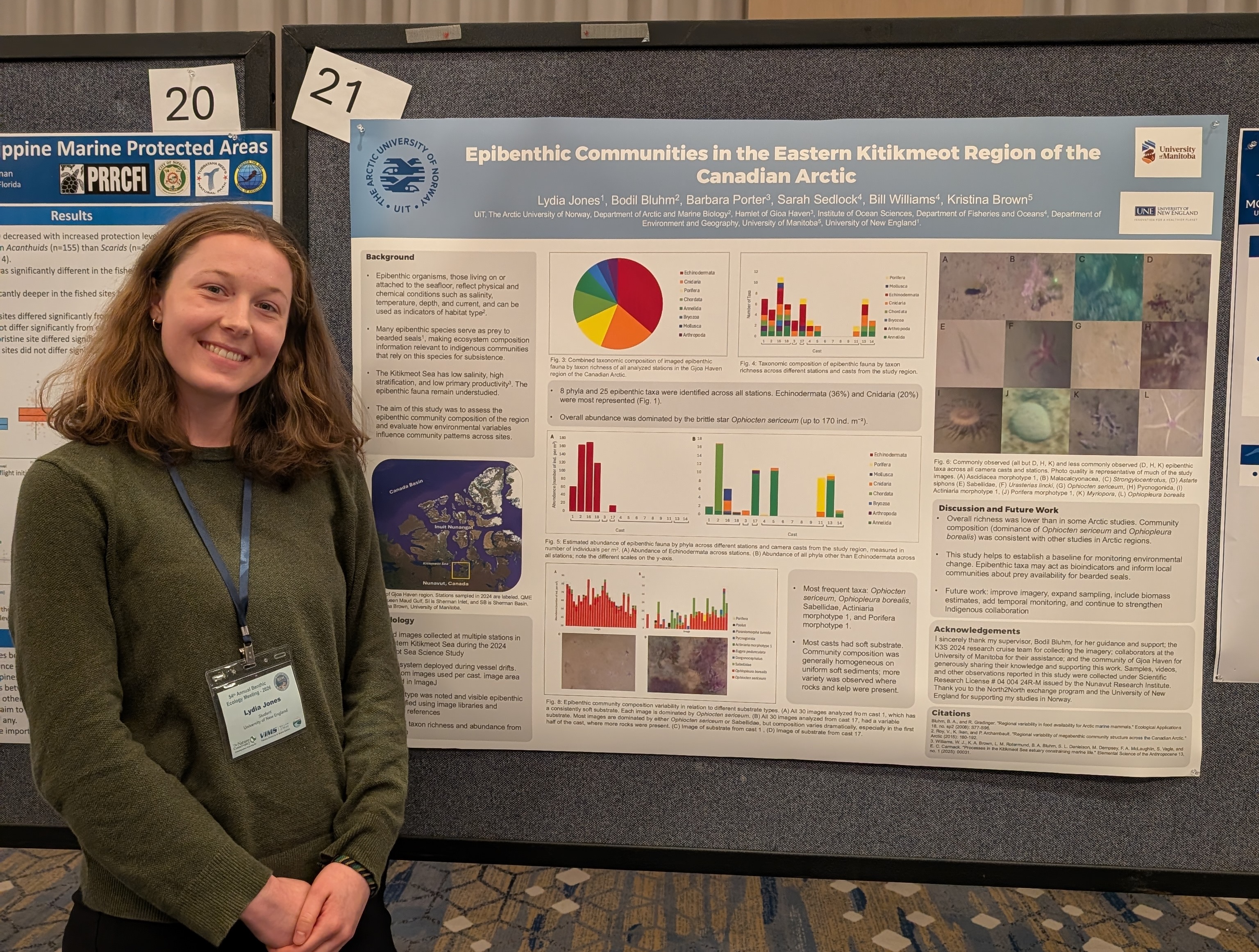 UNE student Lydia Jones poses in front of a research poster