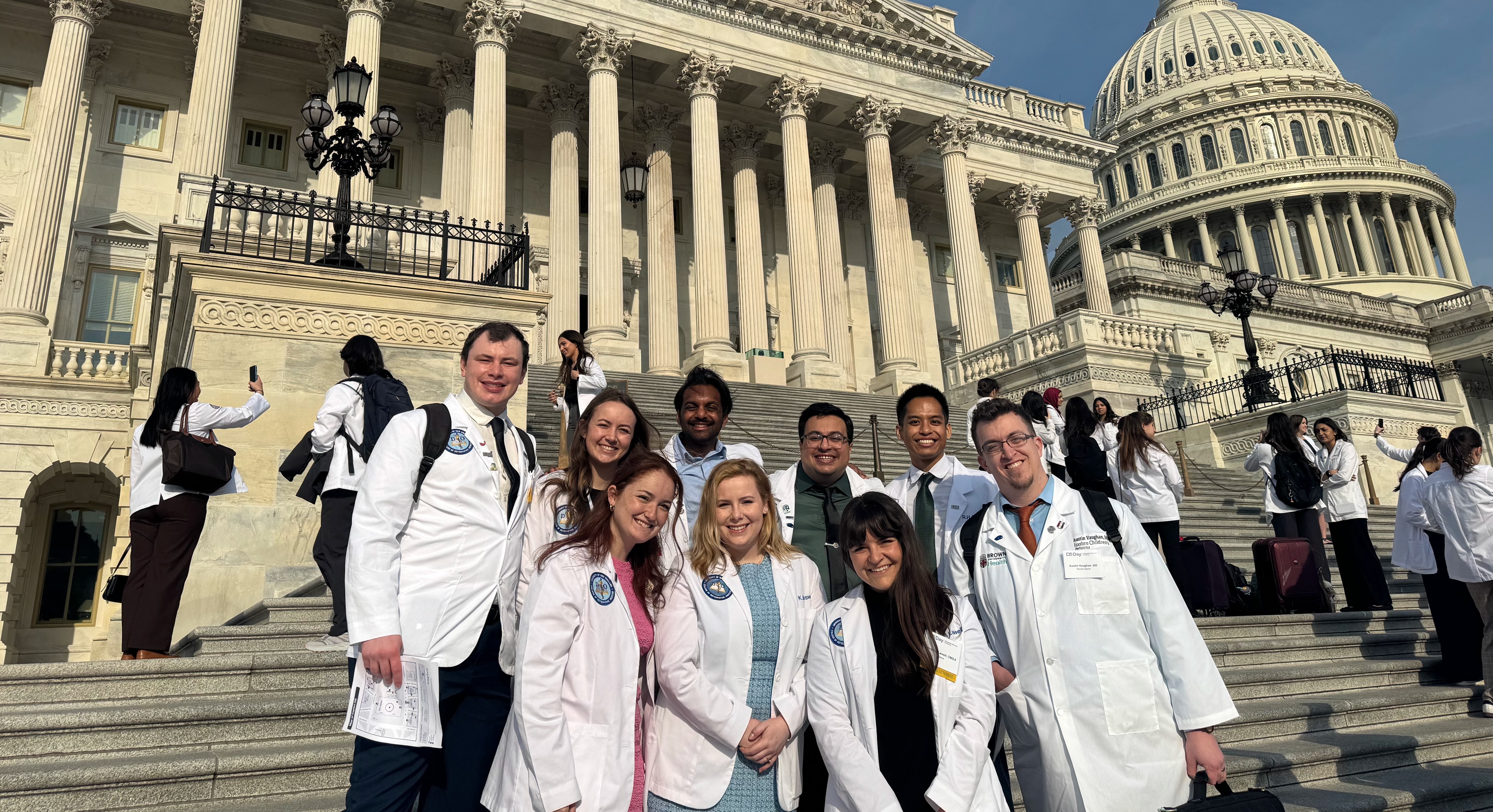 UNE medical students and faculty pose in front of the U.S. Capitol building