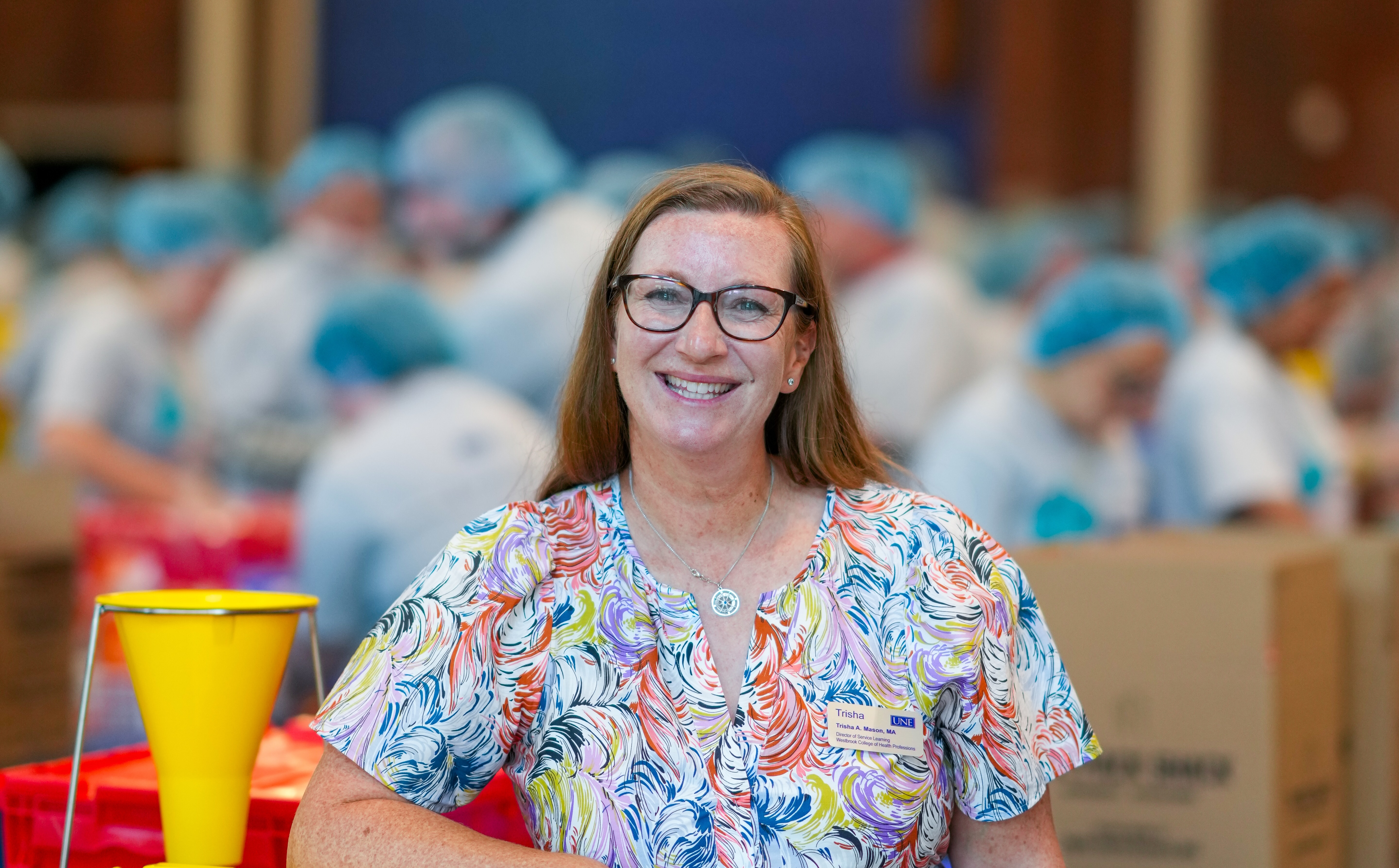 Trisha Mason poses for portrait at 2025 Meals for Maine event