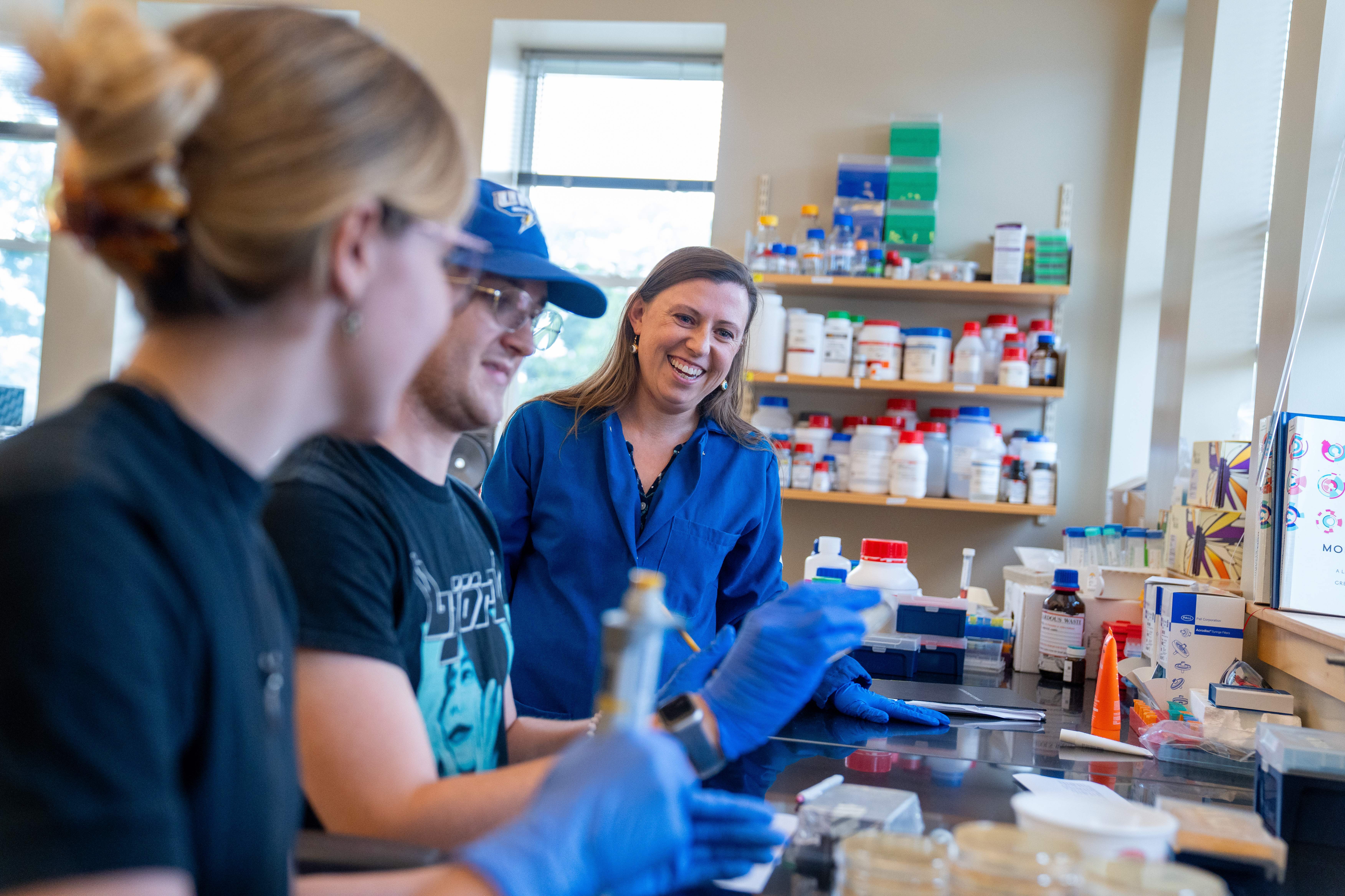 Eva Rose Balog with students in her lab