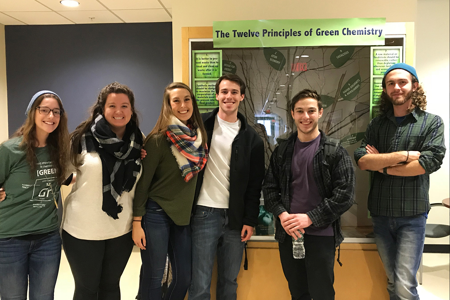 u n e chemistry students pose at the green chemistry commitment signing