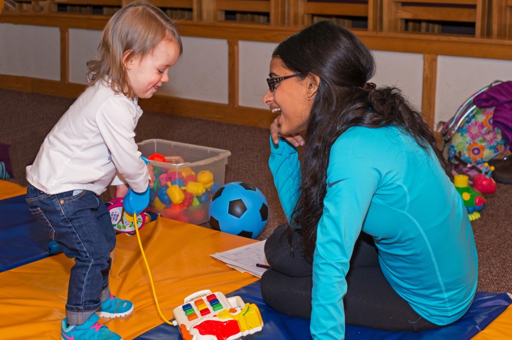 student of occupational therapy degree program working with pediatric patient