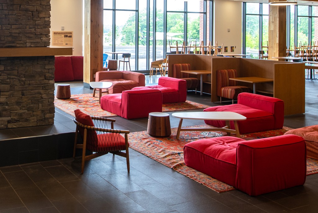 red lounge chairs on the first floor of the Ripich Commons
