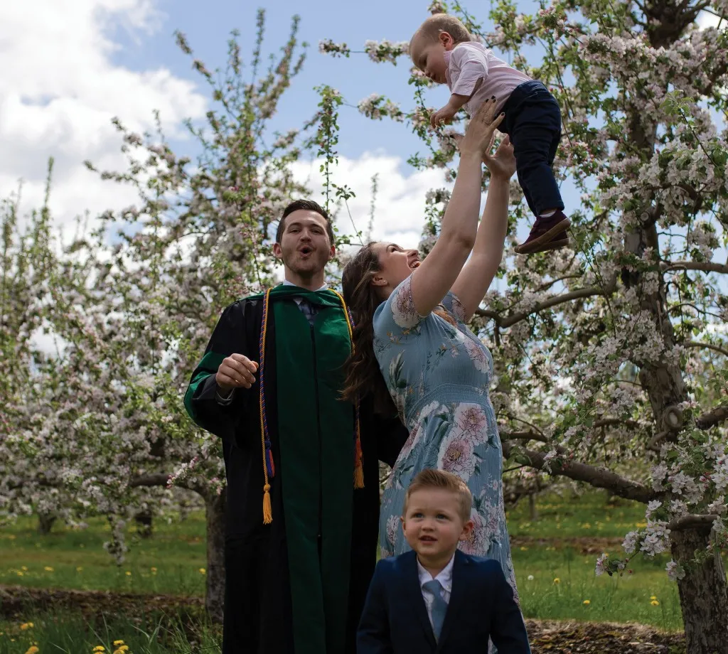 David Shbeeb, D.O. ’20, remotely celebrates his graduation from U N E COM with his family.