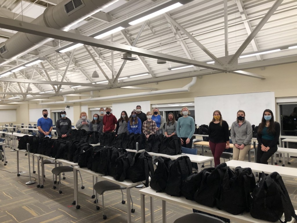 Students from across disciplines packed 64 bags for Milestone Recovery