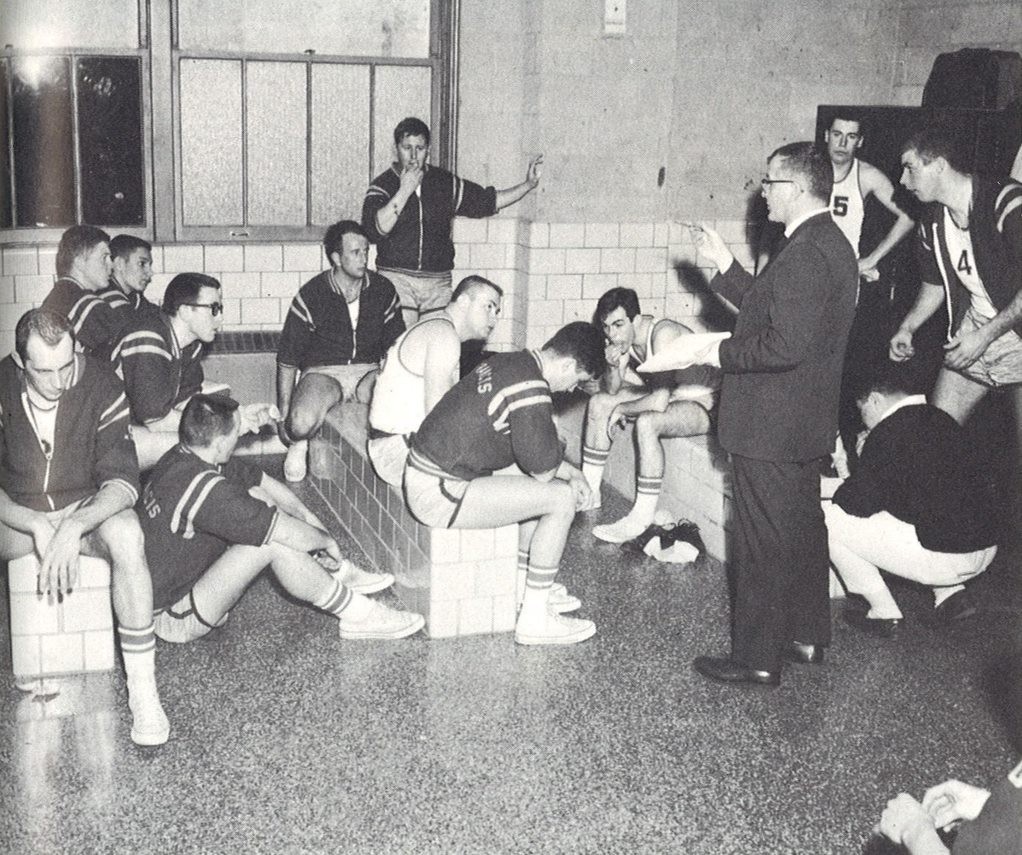 Coach Beaudry gives the 1963-64 Red Knights a pep talk