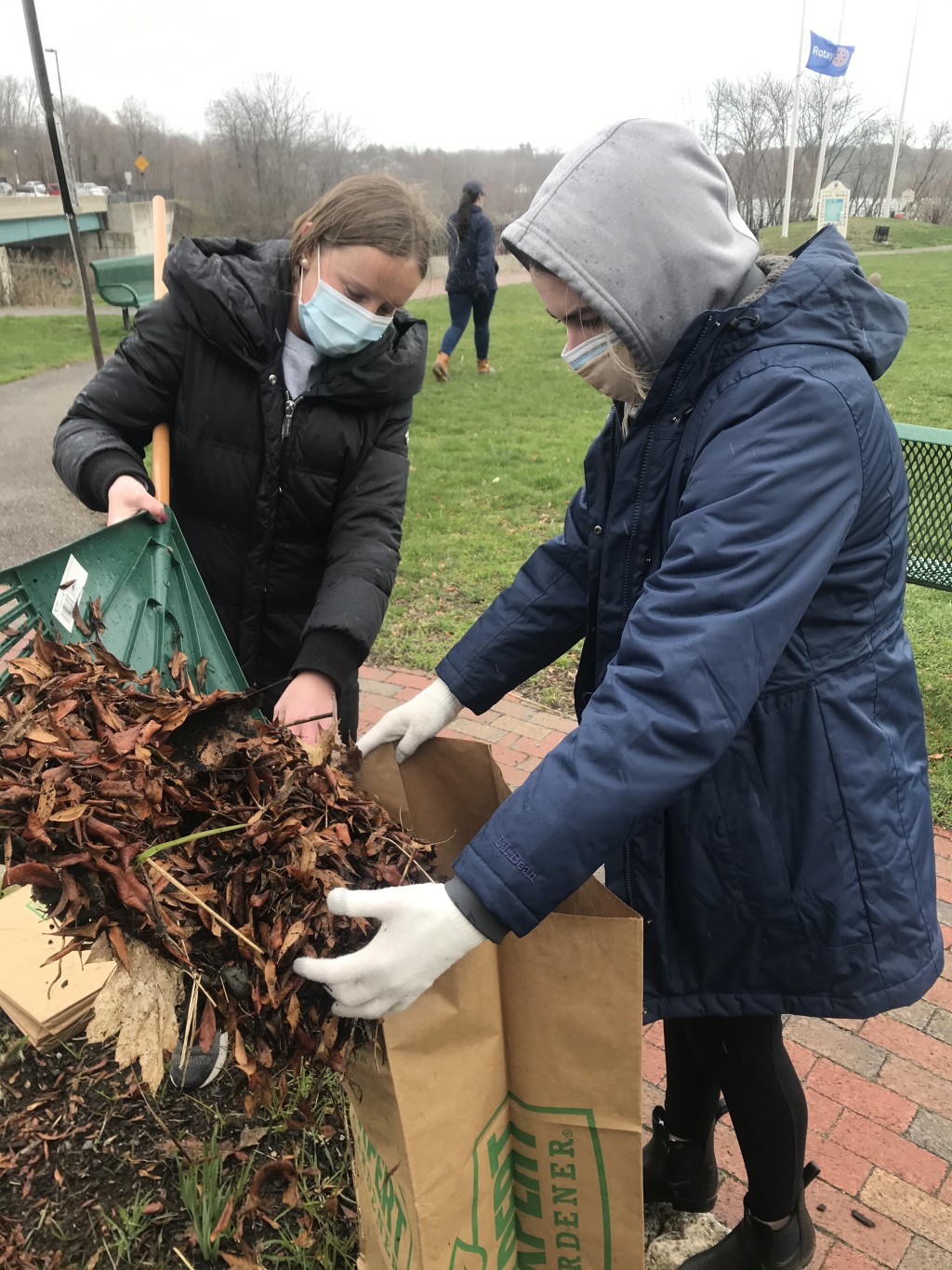 Students pick up leaves during park clean-up