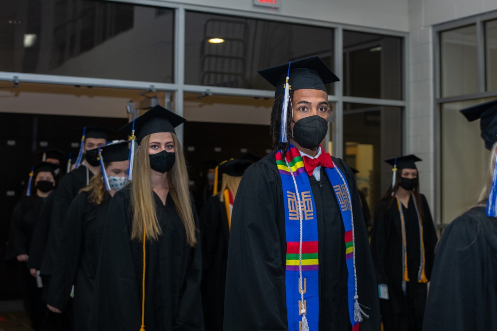 Students march in to Commencement on May 15