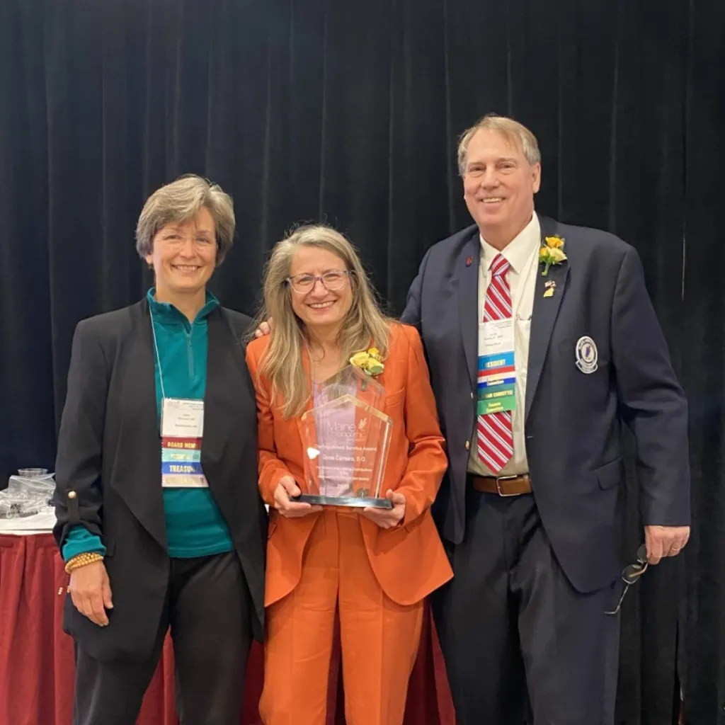Jane Carreiro holds distinguished service award