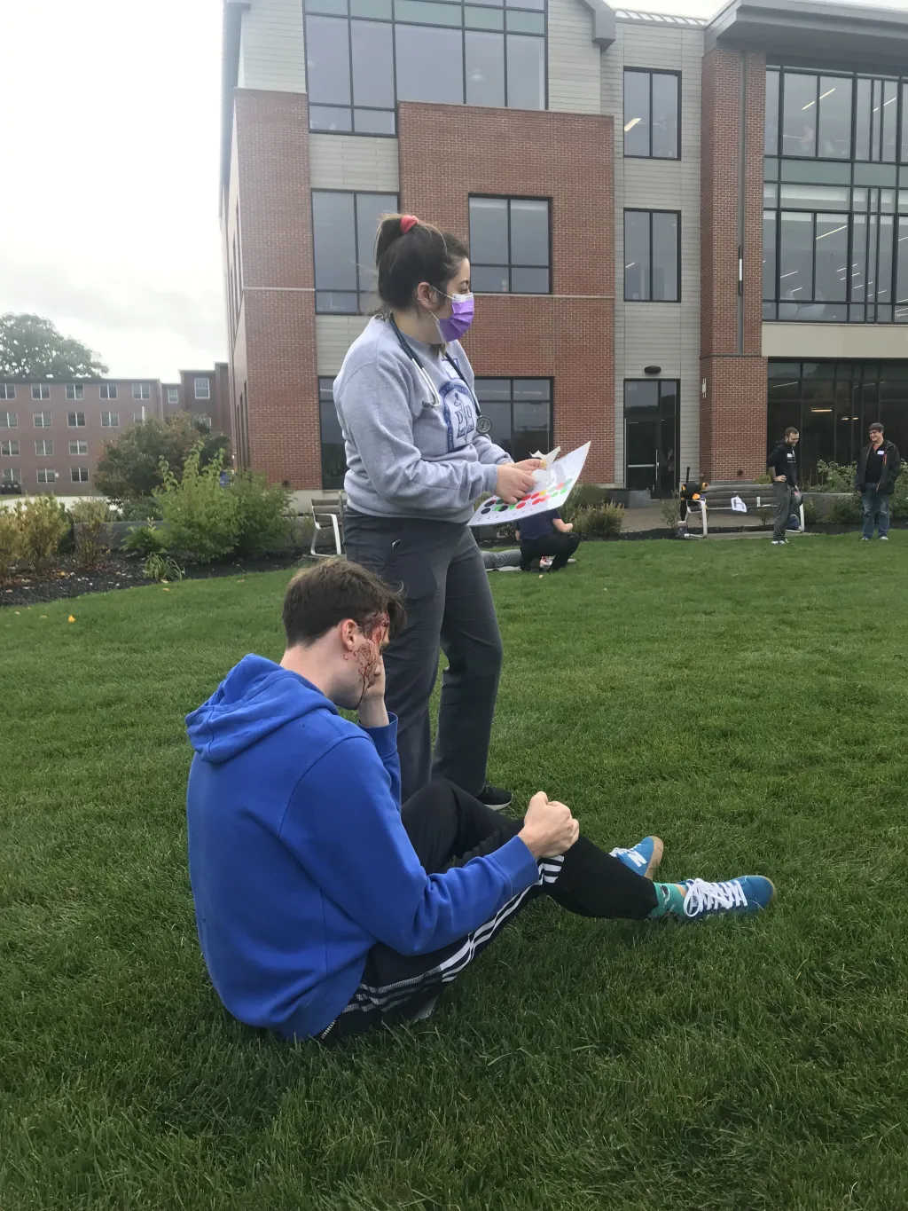 Mock victim being helped