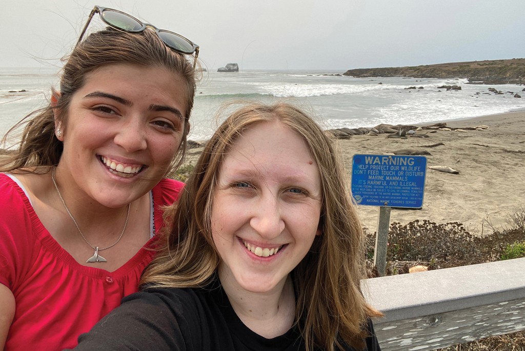 U N E students Morgan Quimby and friend in front of San Simeon elephant seals