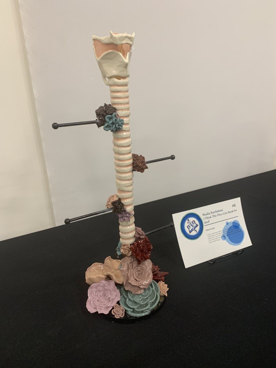 Image of a jewelry hanger designed to look like a trachea