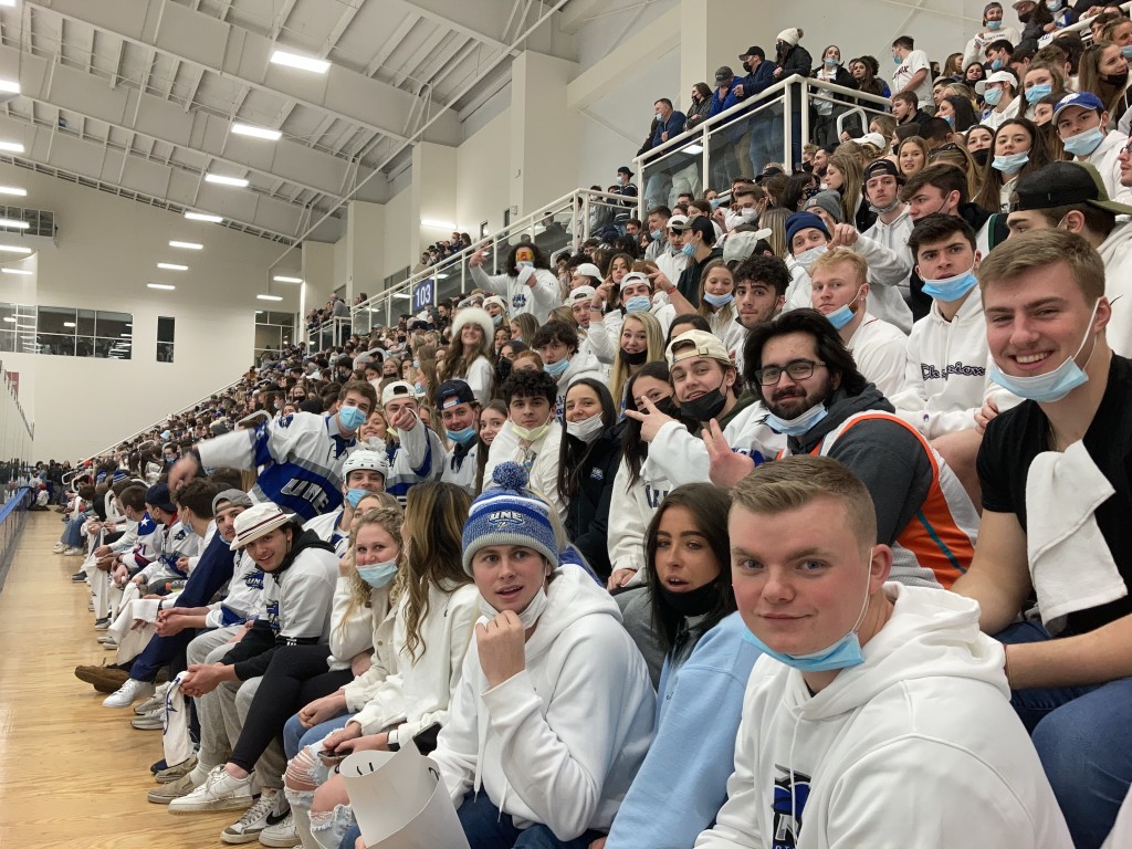 Students sit in the stands at the Harold Alfond Forum