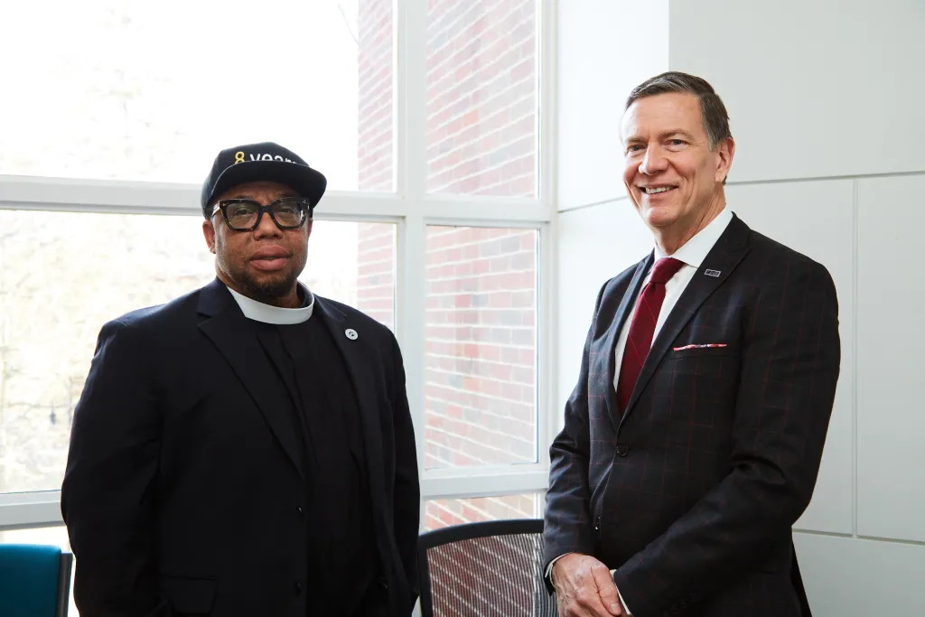 Rev. Lennox Yearwood with UNE President James Herbert
