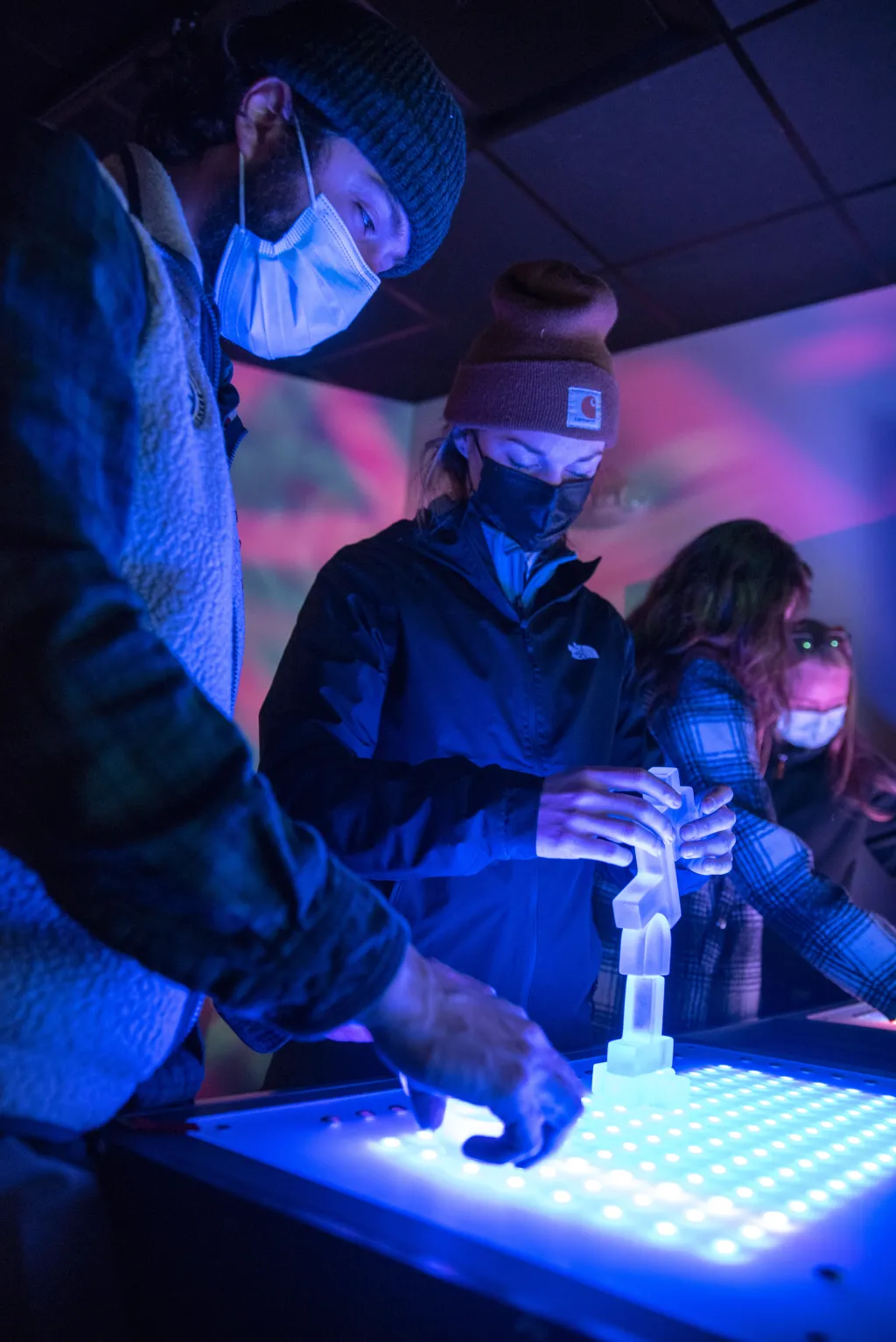 Robert Morley and Ali Crooker play at the "Mix Master" table