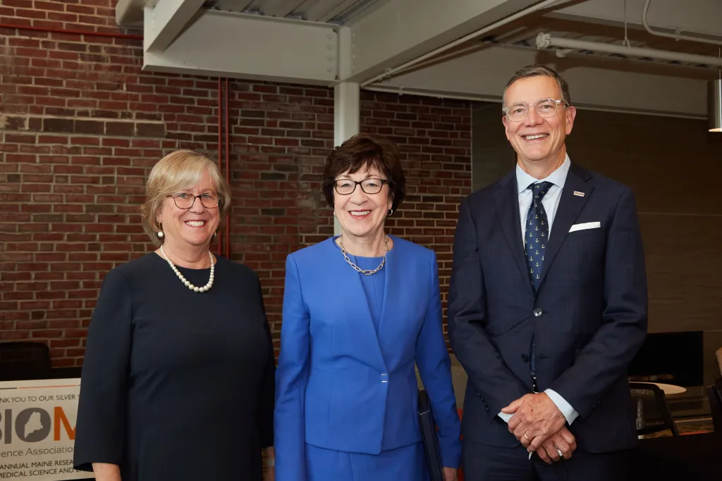 UNE President James Herbert poses with Sen. Susan Collins and UMaine President Joan Ferrini-Mundy