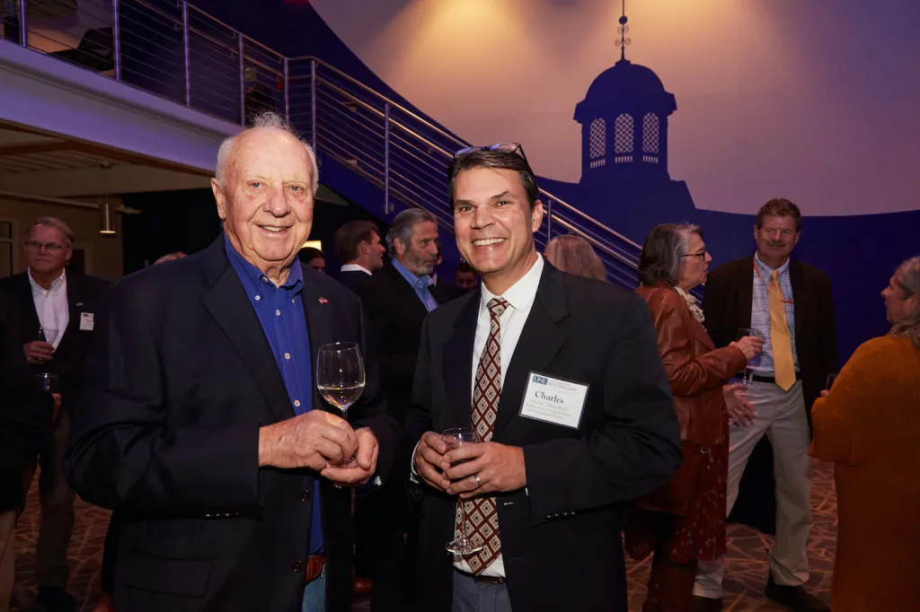 Girard with Charles Tilburg